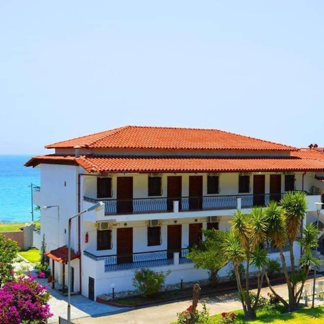 Delfino Hotel Mola Kalyva Exterior foto
